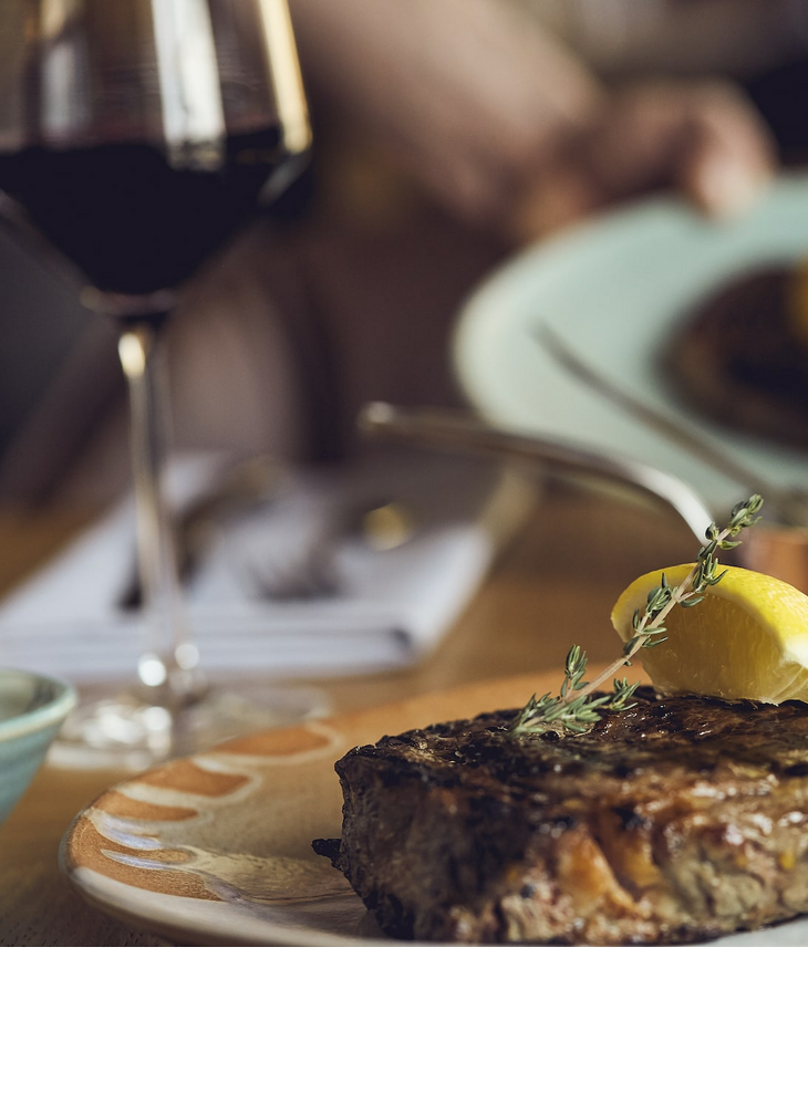 Red wine and steak at The LOUIS Grillroom Munich